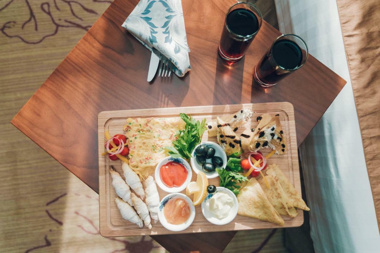 Soluxe Hotel אלמטי מראה חיצוני תמונה